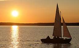 Wooden Boat at Sunset