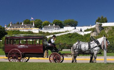 Horse drawn carriage and Ft. Mackinac