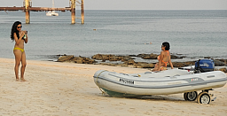 Posing with the dinghy