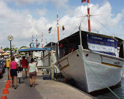 Fishing Boats Lining Road