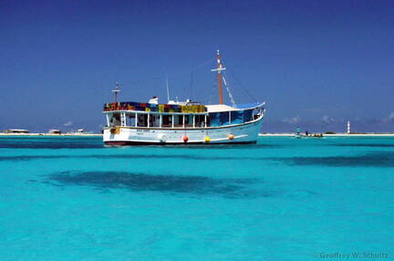 Large Fishing Boat 
and its Shadow