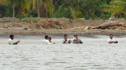 Hand-lining in the water is common