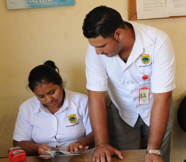 Immigration officers inspecting passports