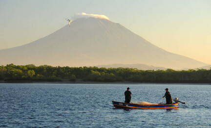 Fishermen and volcano